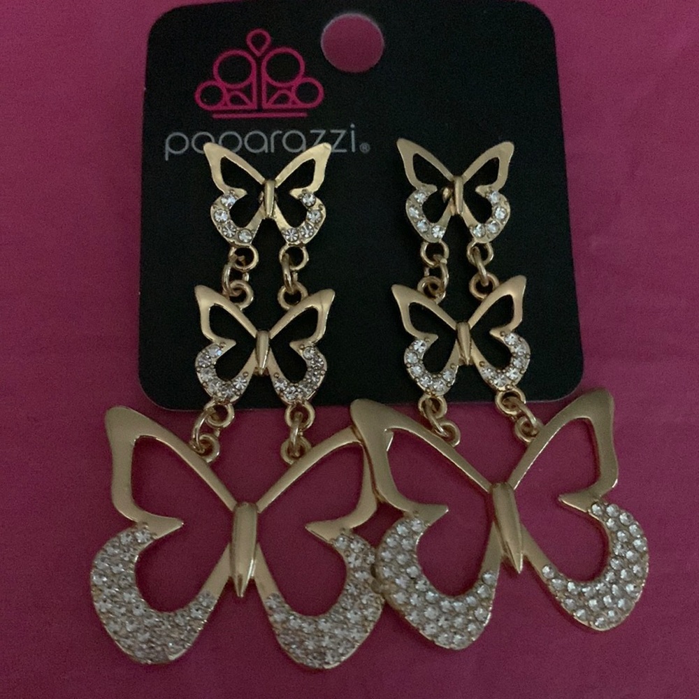 Flamboyant Flutter gold earrings.